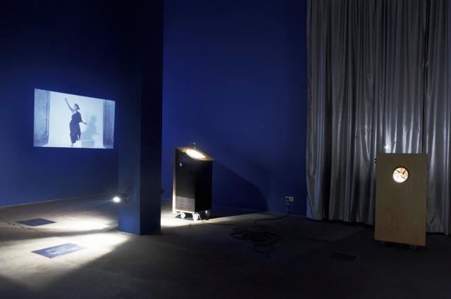 PUBLIC SPEAKING, Exhibition View: Veda Popovici, Revolutionary Gear: The History of Art Retold Through the Black Square, 2015, Photo: Anton Roland Laub, District 2016 PUBLIC SPEAKING, Exhibition View: Veda Popovici, Revolutionary Gear: The History of Art Retold Through the Black Square, 2015, Photo: Anton Roland Laub, District 2016