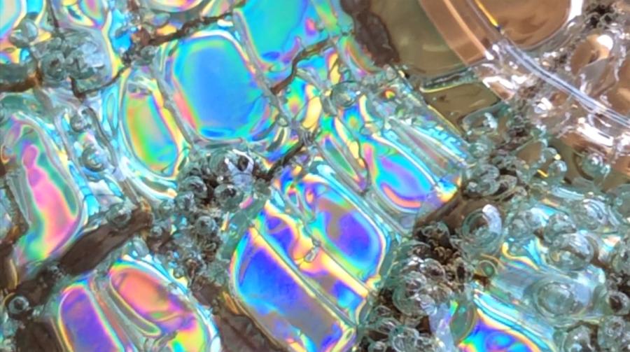 Paul Kneale, SEO & Co, 2015, Still  (closeup of microwaved CD)  Copyright Import Projects